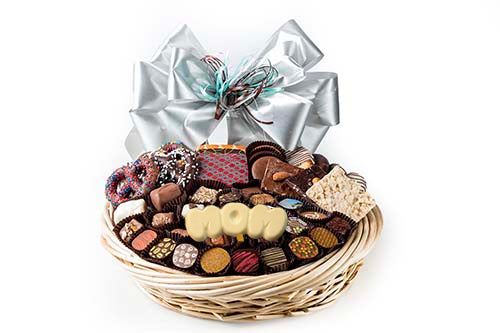 65 Truffles, chocos, cookies, pretzels, plq - Happy Holidays & snowman, foil cvrd snowflakes & trees