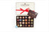 24 truffle, incl. eggnog, pumpkin spice! A choco plaque - Happy Holidays & foil wrap choco snowflake