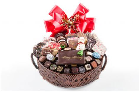 Exotic Bronze vessel with 60 pc of chocos, white chocolate snowman & foil cvrd snowflakes & trees