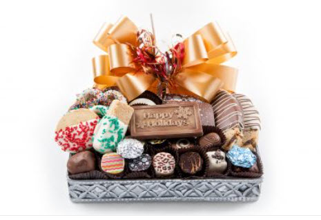 Sm: Silver basket has chocolate pretzels, grahams, Oreo cookies, Biscotti, shortbread cookies, and chocolates and truffles