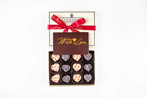 12pc box has 6 vanilla latte & 6 cheesecake truffles, topped with 2oz With Love 12pc box has 6 vanilla latte & 6 cheesecake truffles, topped with 2oz “With Love” dark chocolate plq chocolate plq