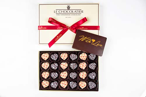 12pc box has 12 vanilla latte & 12 cheesecake truffles, topped with 2oz With Love dark chocolate plq