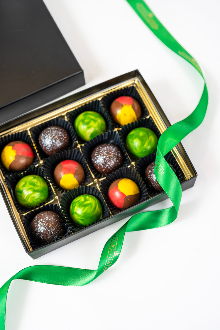 12 PIECE LE CHOCOLATIER JEWEL COLLECTION OF HAND PAINTED TRUFFLES