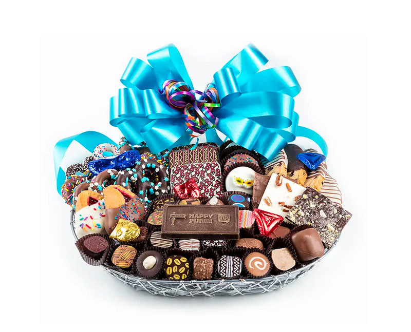 53 pc of chocos & choco cvrd cookies & pretzels. In a slvr twine basket, & a choco Happy Purim plq