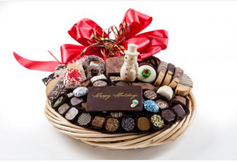 Bskt has 65 truffles, chocolates, cookies, pretzels, chocolate plaque - Happy Holidays & snowman, foil cvrd snowflakes & trees