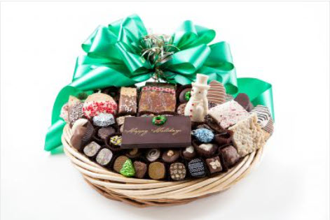 Bskt has 76 truffles, chocolates, cookies, pretzels, chocolate plaque - Happy Holidays & snowman, foil cvrd snowflakes & trees