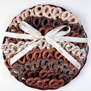 Platter has 56 choco cvrd pretzels, with sprinkles & choco drizzle. Pretzels are kosher with OU cert