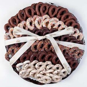 Platter has 65 choco cvrd pretzels, with sprinkles & choco drizzle. Pretzels are kosher with OU cert