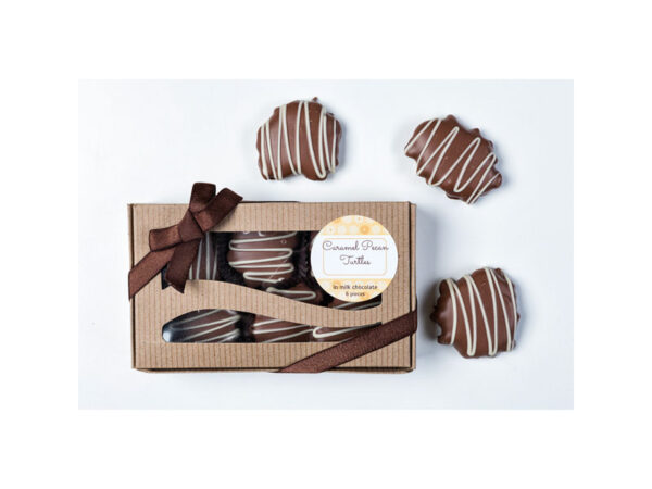 6 Luscious Caramel Pecan Turtles drenched in special milk chocolate. Drizzled with white chocolate.